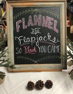 a chalkboard sign that says flannel and frappjacks so glad you came