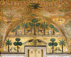 an elaborately painted ceiling in the entrance to a building with trees and animals on it