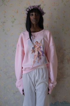 Featuring the depiction of Eros and his mortal beloved, Psyche, entwined in divine union, wrap yourself in this luxuriously soft Huggable Sweater, with its perfect slouchy fit and just-right crop, complemented by a drop-shoulder. Oversized heavy fleece pullover sweater Scoop neck with drop shoulder To ensure the best fit, measure your bust before ordering and steam for optimal beauty. Moa is 5’10” and wearing a size XS in Selkie. Her measurements are 32” bust, 25” waist, 35” hip. Fabric: 80% Cot Divine Union, Silk Dressing Gown, Corset Skirt, Skirt Swimsuit, Puff Dress, Knitted Coat, Maxi Gowns, Garment Bags, Swimsuit Cover