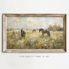 a painting of horses grazing in a field with the words high quality frame tv art