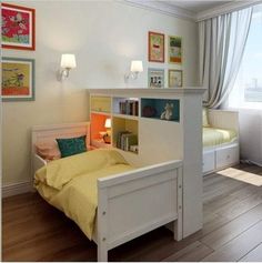 a bed room with a neatly made bed and a book shelf next to the bed