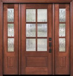 a wooden door with glass panels and sidelights