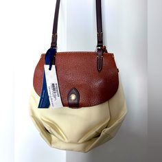 Leather Still Has Tag On Flat On One Side. Had Many Pockets Bag Worth 200-300$ Purchased At A Store For 168$ Selling For 75$ Beige Coated Canvas Crossbody Shoulder Bag, Cream Crossbody Bucket Bag With Removable Pouch, Cream Crossbody Shoulder Bag For Travel, Cream Shoulder Bag With Leather Trim, Cream Satchel Shoulder Bag In Coated Canvas, Cream Coated Canvas Satchel Shoulder Bag, Cream Shoulder Bag With Handle Drop For Travel, White Leather Trim Crossbody Shoulder Bag, Cream Crossbody Bucket Bag