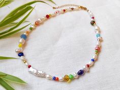 Colorful freshwater pearl necklace is quirky and cute. In this beautiful beaded necklace, I have paired freshwater pearls in different colors, shapes and sizes, with all kinds of colorful glass beads.  14k gold plated / stainless steel. The beading wire I use is high-quality stainless steel, composed of multiple twisted tiny wires that are nylon coated to protect the beads. The length of the necklace is 15 inches (38 cm), with a 2 inches (5 cm) extension chain - so you can adjust the length of y Trendy Multicolor Pearl Necklace For Gift, Trendy Multicolor Pearl Necklace Gift, Trendy Multicolor Pearl Necklace, Trendy Pearl Necklace With Colorful Beads For Gift, Trendy Multicolor Pearl Necklace With Charm, Beautiful Beaded Necklaces, Calm Waters, Freshwater Pearl Necklace, Beading Wire