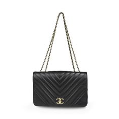 Chanel 'Statement Flap' handbag in black chevron quilted lambskin leather with soft gold hardware. Features a turn-lock logo closure, an adjustable small chain strap, and a black canvas lined interior with a slip and zip pocket. Circa 2019. Includes dust bag. Brand = Chanel Condition = 8/10, Very good, light dents to exterior leather Dimensions = 10" x 7" x 3" Strap Drop = 10.5"-19.5 Material = Leather Hardware = Soft Gold Date Code = 28XXXXXX SKU = 23588-1 Timeless Quilted Business Bag, Timeless Quilted Bag For Formal Occasions, Timeless Quilted Formal Bag, Timeless Quilted Business Shoulder Bag, Timeless Quilted Shoulder Bag For Business, Timeless Quilted Double Flap Bag, Timeless Evening Flap Bag With Cc Turnlock Closure, Timeless Black Quilted Shoulder Bag, Timeless Quilted Black Shoulder Bag