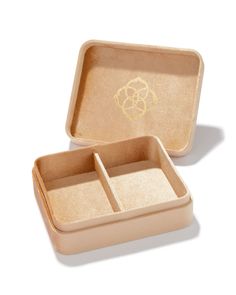 Looking for a storage solution that’s just as stunning as your favorite styles? Look no further than the Mattie Large Box in Champagne. This velvet-covered box is equal parts practical and fashionable, with large compartments to organize your jewelry in style. Material Velvet Size Exterior: 6.3" x 5.3" x 2.0", Interior: 6.1" x 5.0" (with .15" height divider) Please note: Due to the one-of-a-kind nature of the medium, exact colors and patterns may vary slightly from the image shown. | Kendra Scott Mattie Large Box in Champagne | Velvet Kendra Scott Store, Sold Out Sign, Birthday Discount, Wash Your Hands, Small Boxes, Storage Solution, Kendra Scott, Storage Solutions, Make It Simple