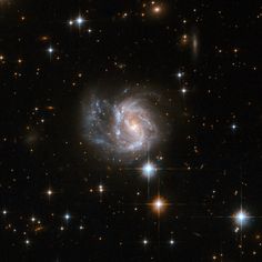 an image of a spiral galaxy in the sky