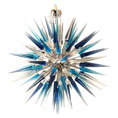 a blue and silver chandelier hanging from a ceiling