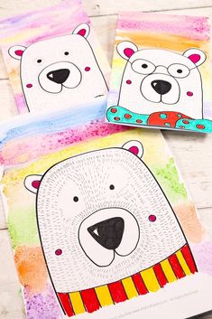 three polar bears are painted on colorful paper