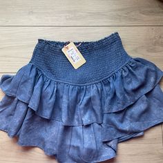 Brand New With Tags Medium Denim Color Ruffled Skirt Purchased At A Local Boutique Spring Denim Blue Mini Skirt With Ruffles, Spring Denim Blue Ruffled Mini Skirt, Indigo Washed Bottoms For Spring, Summer Denim Tiered Mini Skirt, Casual Denim Blue Mini Skirt With Ruffles, Casual Denim Blue Ruffled Mini Skirt, Spring Denim Blue Skirt With Ruffles, Denim Blue Ruffled Skirt For Spring, Medium Wash Ruffled Skirt For Spring