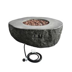 Boulder Fire Table by Elementi The Elementi rock Gas Fire Pit Table is made of high-performance cast concrete and is shaped to look like a rock.The Boulder can run on either propane or natural gas, which is also known as mains gas.You can easily change the Boulder's heat—just turn the dial when you need more. The Boulder also has an electrical method for starting the engine.The hob puts out 13.2KW, which is more than enough to keep you warm on the coldest nights. Features Body construction: High-performance cast concrete Burner ring size: 12" diameter Burner ring construction: 16 gauge, 304 stainless steel Burner pan size: 17.7" diameter Burner pan construction: 16 gauge, 304 stainless steel Control system: Electronic ignition with auto safety shut-off Natural gas item number: OFG110NG Pro Boulder Fire Pit, Ice Bowl, Wood Stove Cooking, Modern Flames, Gas Fireplace Insert, Fire Pit Accessories, Fire Pit Bowl, Wood Burning Fires, Small Snacks