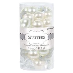 white and silver pearls in a clear plastic container with the word scatters on it