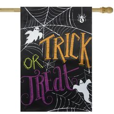 a trick or treat card with spider webs on it