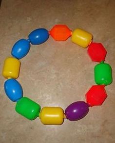 a multicolored bracelet with plastic beads