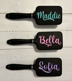 "This personalized paddle brush makes a great gift for bridesmaid or wedding party. It's also great for teens, college students, teachers, dance teams, and cheer squads! Each brush comes individually wrapped with a matching ribbon.  For multiple brushes, select the quantity needed and list all names in the text box.  Please include in your message during checkout: 1) Text for your brush(es) 2) Font Choice (see font selection in photos) Please enter the name you would like on the brush, taking the time to ensure all spelling is correct as the text will be copied exactly as is written. Note: ️ Don't see a design or logo you're looking for? Send a message and we can create it! ⁉️ For a monogram, please list the text/initials as \"first LAST middle\" to avoid confusion. 🤔 Having trouble picki Customized Hair Brush, College Birthday, Cheer Squad, Hair Pack, Paddle Brush, Styling Brush, Dance Teams, Text Box, Hair Brush