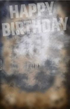 the words happy birthday are written in white on a black and brown background with clouds