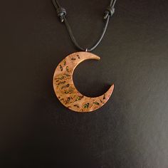 My guarantee to you is that all of the Jewellery you see in my shop is handmade by me and not purchased from any third party's ★DESCRIPTION★ Crescent Moon Necklace With Rainbow & Cosmic Lab Grown Opal Inlay. (please choose rainbow from the drop down menu) Made From Oak Burr/Burl Wood.  There are 2 styles for the moon, please leave a note if you want the other style in photo 3 and 4 There is a choice to have gemstone or lab grown opal. For natural Ethiopian Opal inlay, please message me for price Handmade Celestial Moon Necklace, Artisan Moon Charm Necklaces, Unique Crescent Moon Charm Necklace, Handmade Moon-shaped Artistic Jewelry, Handmade Moon-shaped Spiritual Necklace, Handmade Moon Shaped Artistic Jewelry, Handmade Moon Shape Spiritual Necklace, Handmade Artistic Moon-shaped Jewelry, Handmade Spiritual Moon Necklace