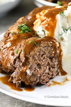 meatloaf with mashed potatoes and gravy on a plate