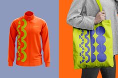 a woman holding a neon green and orange bag next to an orange and blue shopping bag