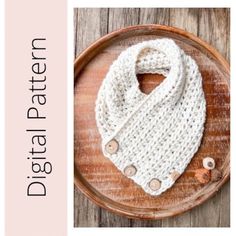 a white knitted cowl with buttons on it and the words data pattern written below