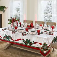 a dining room table with christmas decorations on it