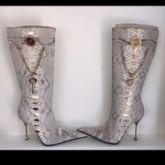 Brand New With Tags Never Been Worn Python Snake Hand Printed With Gold Flake Excellent Used Condition High End Items For Less Pointed Tips Made In Italy Luxury Gold Boots, Luxury Party Boots, Elegant Silver Snip Toe Boots, Luxury White Party Boots, Elegant Gold Formal Boots, Designer Snip Toe Boots For Party, Luxury Gold Boots For Party, Luxury Gold Party Boots, Luxury Snip Toe Boots For Galas