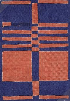 an old blue and orange cloth with squares on it