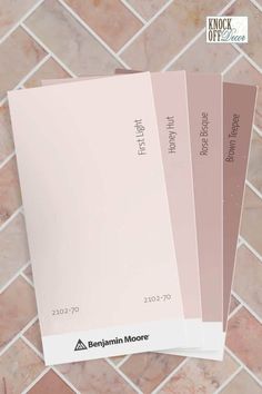 three different shades of pink and white tile on a wall with the words behrian moore