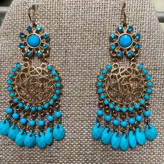 Turquoise And Gold Chandelier Earrings. Purchased At Nordstrom. New Never Worn. Blue Pierced Drop Chandelier Earrings, Blue Beaded Chandelier Earrings, Blue Chandelier Earrings With Dangling Beads, Turquoise Drop Chandelier Earrings With Ear Wire, Turquoise Chandelier Drop Earrings, Turquoise Chandelier Dangle Earrings, Nordstrom Jewelry, Gold Chandelier Earrings, Turquoise And Gold