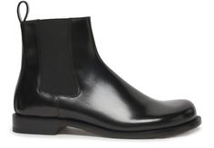 The versatile Terra Boot from Italy pulls adventure in with every step. Featuring a soft black leather, elastic sides for easy on/off, and sturdy 2.5 cm heel, they journey comfortably from city streets to rugged trails. Perfect for the Insta-nomad, their simple yet durable design keeps wanderlust at your feet. Elegant Black Chelsea Boots With Rubber Sole, Elegant Slip-on Chelsea Boots With Rubber Sole, Elegant Black Chelsea Boots With Rubber Heel Cap, Elegant Formal Slip-on Chelsea Boots, Elegant Black Chelsea Boots For Galas, Sleek Black Chelsea Boots For Formal Occasions, Elegant Slip-on Chelsea Boots In Calf Leather, Jm Weston, Espadrilles Sneakers