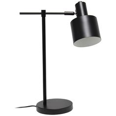 a black table lamp on a white background