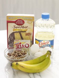 ingredients to make an oatmeal smoothie sitting on a counter top with bananas