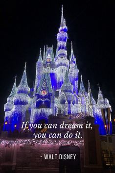 a castle lit up at night with the quote if you can dream it, you can do it