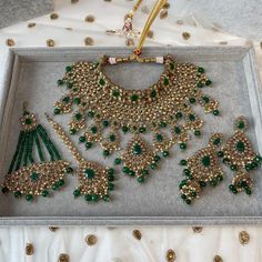 Antique gold polished necklace set made up of of champagne zircon crystals and faux tiny pearl drops and statement dark green glass beads.  Necklace comes complete with matching tikka, and earrings measuring around 3 inch in length and Optional jhumar. Necklace is adjustable to fit any size.  Ready to ship as seen with gift box. Bride Jewelry Set, Pearl Jewelry Design, Bridal Lehenga Red, Jewelry Quotes, Bangles Jewelry Designs, Green Jewelry, Gold Polish, Bridal Jewelry Sets, Bangles Jewelry