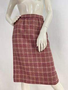 "Vintage houndstooth plaid skirt, plaid skirt, lined plaid skirt, lined skirt, 27\" waist, there's  no tag listing the material but it feels like a wool/wool blend  Measurements:  Waist 13.5\"/hip 18\"/length 25\" Mannequin measurements:  5'8\", bust 34\", waist 25\", hip 33\" Please note that vintage clothing sizes can vary greatly.  The Measurements provided  are approximate and are taken lying flat.  I suggest taking a similar garment from your wardrobe and measure it while lying flat.  This Tweed Lined Skirt For Fall, Plaid Tweed Bottoms For Fall, Tweed Pencil Skirt With Lining, Fall Fitted Skirt With Houndstooth Pattern, Classic Plaid Skirt For Fall, Plaid Skirted Bottoms For Fall, Fall Tweed Pencil Skirt, Fall Plaid Relaxed Fit Skirt, Plaid Relaxed Fit Skirt For Fall