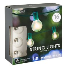 string lights with white bulbs and green wire are in the box on the left side