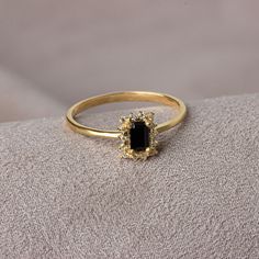 It provides concentration. It eliminates mental confusion. It supports the person with its energy in everything he needs. It is a grounding stone and reduces stress. Our rectangular black onyx stone ring surrounded by real diamonds will add elegance to your hands. It is a ring that you can use both on special occasions and in daily life. It is a beautiful and stylish product that you can gift to yourself and your loved ones. Don't forget to visit our store for all our other jewellery... https:// Classic Gold Onyx Rings, Black Stone Ring Women, Gold Onyx Ring Perfect For Gifts, Minimalist Yellow Gold Onyx Jewelry, Minimalist Gold Onyx Ring, 14k Gold Black Gemstone Rings, Gold Onyx Ring, Mental Confusion, Black Stone Ring