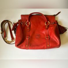 Never Used Been In Closet Storage. Pictures Of Any Wear. Elegant Red Bag With Brass Hardware, Elegant Red Shoulder Bag With Brass Hardware, Red Travel Bag With Brass Hardware, Classic Red Bags With Brass Hardware, Red Shoulder Bag With Brass Hardware For Everyday Use, Dooney & Bourke Bags, Dooney Bourke, Red Color, Bag Lady