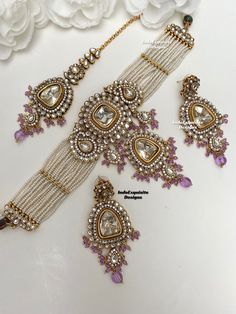 Premium quality Kundan pearls Choker comes with gorgeous Earrings and Tikka/ Indian Jewelry/Unique Polki and Kundan Jewelry/lavender/lilac/light purple   All items are shipped from Brampton, Ontario, Canada. If you need your item by a certain day, please reach out to us for express delivery option before placing the order so that we can update the shipping for you. Standard shipping/delivery timeline Below are the delivery timeline estimates. We dispatch all orders by the next business day. ---> Purple Indian Jewelry Set, Luxury Pink Kundan Necklace For Wedding, Purple Meenakari Wedding Sets, Elegant Purple Kundan Necklace For Festive Occasions, Elegant Purple Kundan Necklace For Wedding, Purple Stone Work Jewelry For Wedding, Purple Meenakari Jewelry For Wedding, Purple Kundan Earrings For Wedding, Festive Purple Wedding Jewelry