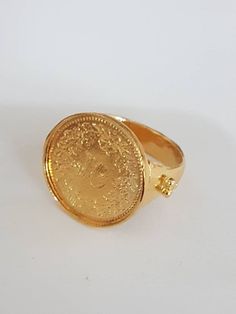 Signet ring women, gold coin ring, pinky ring, coin signet ring, coin pinky ring, coin pinky ring, silver coin ring, mens ring This lovely, silver coin ring was made of a Swiss Franc 10p coin, which was soldered to a wide handmade band decorated with silver granolites, creating a beautiful signet ring for women. The signet coin ring is available both in 14k gold plating over brass or silver and in solid sterling silver shiny or slightly oxidized. The ring is a great signet ring for women and cou Vintage Coin Shaped Signet Ring Gift, Vintage Coin Signet Ring As Gift, Vintage Coin Signet Ring For Gift, Elegant Engraved Coin Rings, Vintage Tarnish-resistant Round Rings, Adjustable Round 14k Stamped Signet Ring, Adjustable Round Signet Ring, Adjustable Round Signet Ring Stamped 14k, Handmade Engraved Round Ring In Fine Jewelry Style