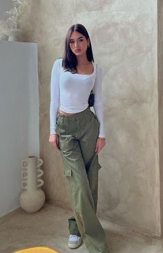 Khaki Low Rise Cargo Pants
These low rise khaki pants are super cool and stylish! Grab sunnies and a bag for an off duty fit that you're sure to love. Be sure to pair with a cute crop and gold jewellery to complete this look! 

Elasticated waistline
Zip closure on the front
Unlined
Full length
Belt loops
6 pockets- 4 on the front, 2 on the back 6 Pocket Pants Outfit For Women, Trendy Cargo Pants For Summer Day Out, Trendy Summer Cargo Pants For Day Out, Casual Cargo Style Pants For Day Out, Casual Cargo Pants For Fall Day Out, Chic Khaki Cargo Pants For Spring, Chic Green Cargo Pants For Fall, Chic Green Cargo Pants For Spring, Chic Spring Streetwear Cargo Pants