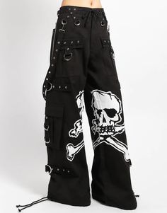 Accept no imitations! From the originator of all things DarkStreet, these black 'bad to the bones' pants feature removable straps, adjustable ankles, D-rings, and deep pockets with printed skull graphics inbetween the legs. WOMAN IS WEARING X-SMALLMAN IS WEARING MEDIUMSIZING BASED ON MENS FIT– Refer to Unisex Darkstreet Pant - Size Chart (Based on Men's Sizing)– Drawstring and adjustable waist buckles allow for a tighter fit on the waist– 100% Cotton.– Hand wash cold. Lay flat to dry. Skull Pant, Trip Pants, Emo Pants, Skull Pants, Goth Pants, Tripp Pants, Cool Pants, Gothic Pants, Elephant Pants