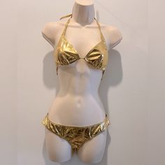 Tried On But Never Worn. Gorgeous Still Looks New. Fabulous Gold Color Size 2 Top And Bottom Questions? Leave A Comment Below! Metallic Fitted Swimwear For Beachwear, Fitted Metallic Swimwear For Beach, Metallic Fitted Triangle Top Swimwear, Fitted Gold Swimwear For Summer, Gold Triangle Top Swimwear For Festivals, Gold Fitted Swimwear For Festival, Gold Festival Swimwear, Fitted Gold Swimwear For Festival, Gold Fitted Swimwear For Beach Season