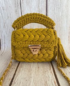 Handwoven bag,handmade bag,Bag,Hand Knitted Bag,Hand Woven Bag,Bag,Knitted Bag,Crochet Bag,Women's Bag,Shoulder bag,Black bag,Luxury Bag,Designer Bag,White bag,Crochet Handmade Bag    Handmade Knitted Crochet Bag made with cotton yarn. This stylish purse is available with lots of color options!   Size: 9x8 Inches - 23x20 Centimeters ★ Discover all our products here:     https://www.etsy.com/shop/mutlubagstore  If you want another color or size don't hesitate to send me a message with your preference!  Be sure that all items are made and stored in a smoke free environment. ->Do not wash. Clean it carefully with a damp sponge ->Note that actual colors may vary due to different displays. ->Feel free to message me for further details Custom orders are welcomed. Thank you for visiting my shop Designer Bags Black, Beige Birthday, Hand Knit Bag, Handwoven Bag, Knitted Bag, Womens Bag, Stylish Purse, Luxury Bag, Bag Luxury