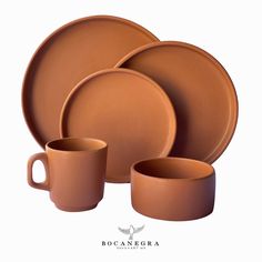 a set of brown dishes and cups on a white background with the words bocanebra written below it