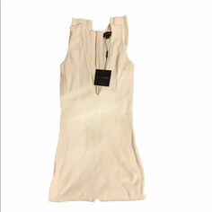 Nwt Jluxlabel Ivory Jemma Ribbed Sleeveless Deep V Plunge Jumpsuit -Size: Large -Measurements Approx: Bust To Bust: 14.5”(Not Stretched) -Total Length: 56” -Inseam: 30” -Color: Ivory -Material: 70% Rayon/30% Nylon -Style: Deep V Plunge Front; Sleeveless; Ribbed; Back Gold Zippering; Stretchy -Style #: Rjl90022hr -Condition: New W/ Tag -Color May Vary -Photo: Jluxlabel -Accurately Described & Represented -Final Sale. Backed By Pm Buyer Protection. Buyer Agrees To & Understands Condition Of Item. Fitted Sleeveless Neutral Tank Top, Fitted Neutral Sleeveless Tank Top, Chic Fitted Neutral Tank Top, Chic Neutral Fitted Tank Top, Plunge Jumpsuit, Color Ivory, Deep V, Final Sale, Pant Jumpsuit