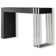 a black and silver wall mounted shelf with three metal bars on the bottom one side