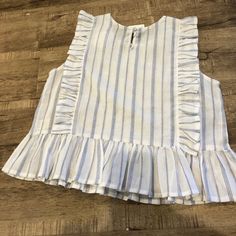 This Super Cute Top With Blue Vertical Strips And Ruffin Details Would Look So Cute With Denim Or White Denim Shorts White Denim Casual Tops, White Denim Top For Day Out, Spring White Denim Top, White Denim Tops For Spring, Striped Cotton Tops For Brunch, Cotton Striped Tops For Brunch, Light Wash Cotton Tops For Brunch, Chic White Denim Tops, Creme White