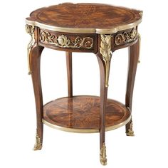 an ornate wooden table with gold trimming