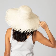 Frayed edges are a classic way to show off your personality without compromising a natural aesthetic. Featuring a 4.5" brim and classic round crown, this hat is perfect for warm weather outings to the beach, park, or pool. 100% straw 4.5" brim Women's One Size Adjustable Lightweight Natural Straw Hat For Vacation, Natural Lightweight Straw Hat For Vacation, Lightweight Hats With Curved Brim For Sunbathing, Lightweight Curved Brim Hat For Sunbathing, Brimmed Hats For Warm Weather Vacation, Lightweight Flat Brim Panama Hat For Vacation, Lightweight Natural Straw Hat For Day Out, Beachy Boater Hat With Curved Brim For Vacation, Lightweight Flat Brim Straw Hat For Summer